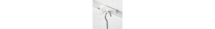 Oval hanging buttons adhere to flat surfaces for hanging displays.jpg