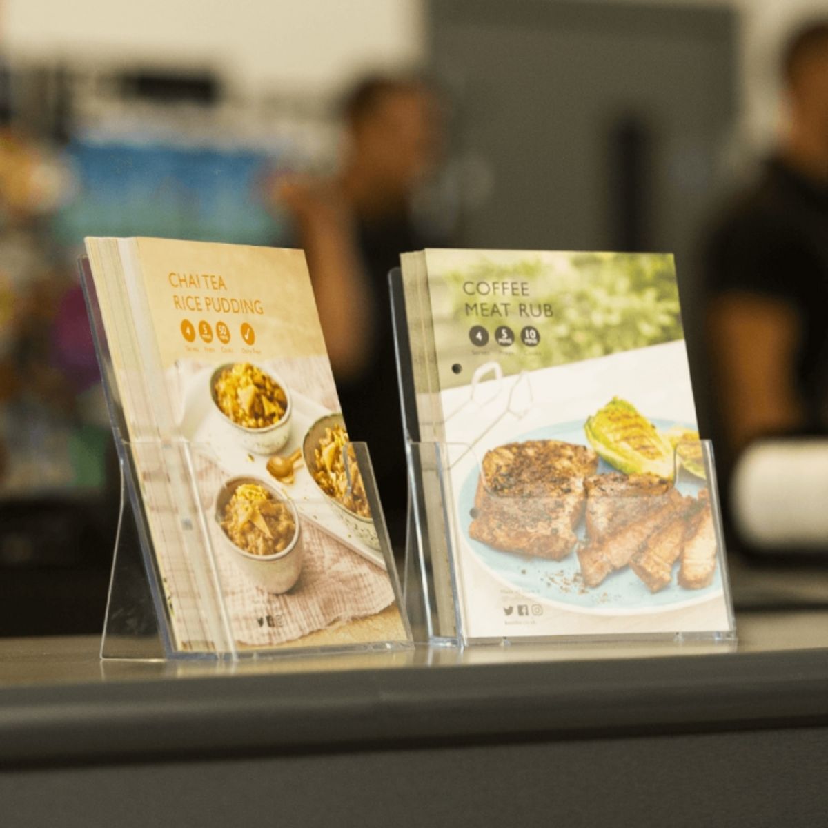 Portrait countertop leaflet holder for holding promotional material.png