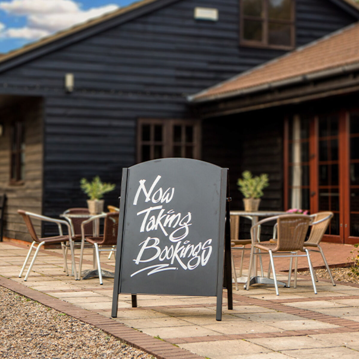 Premier A-Board outside holiday lodge showing bookings artwork.jpg