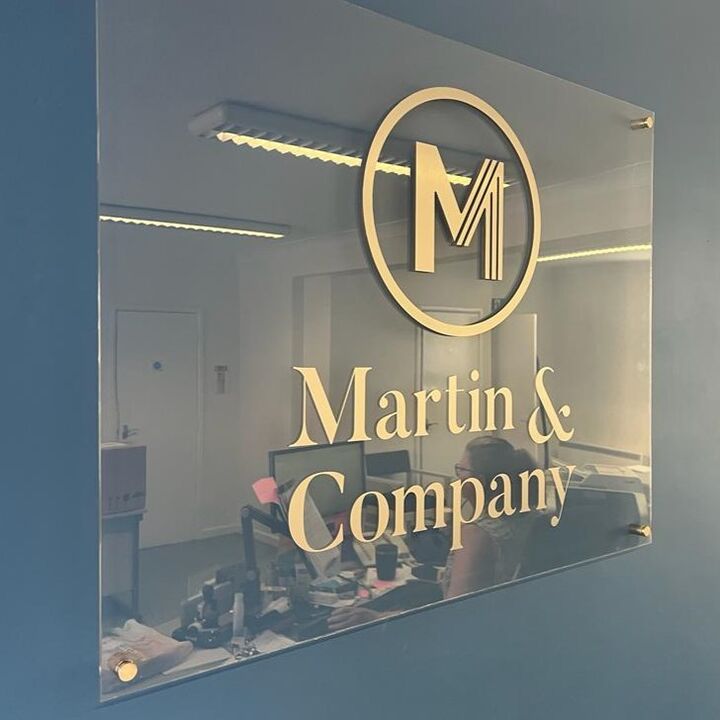 Printed Acrylic Signage with Stand off wall mounted fixings - gold text on clear perspex 1.jpg