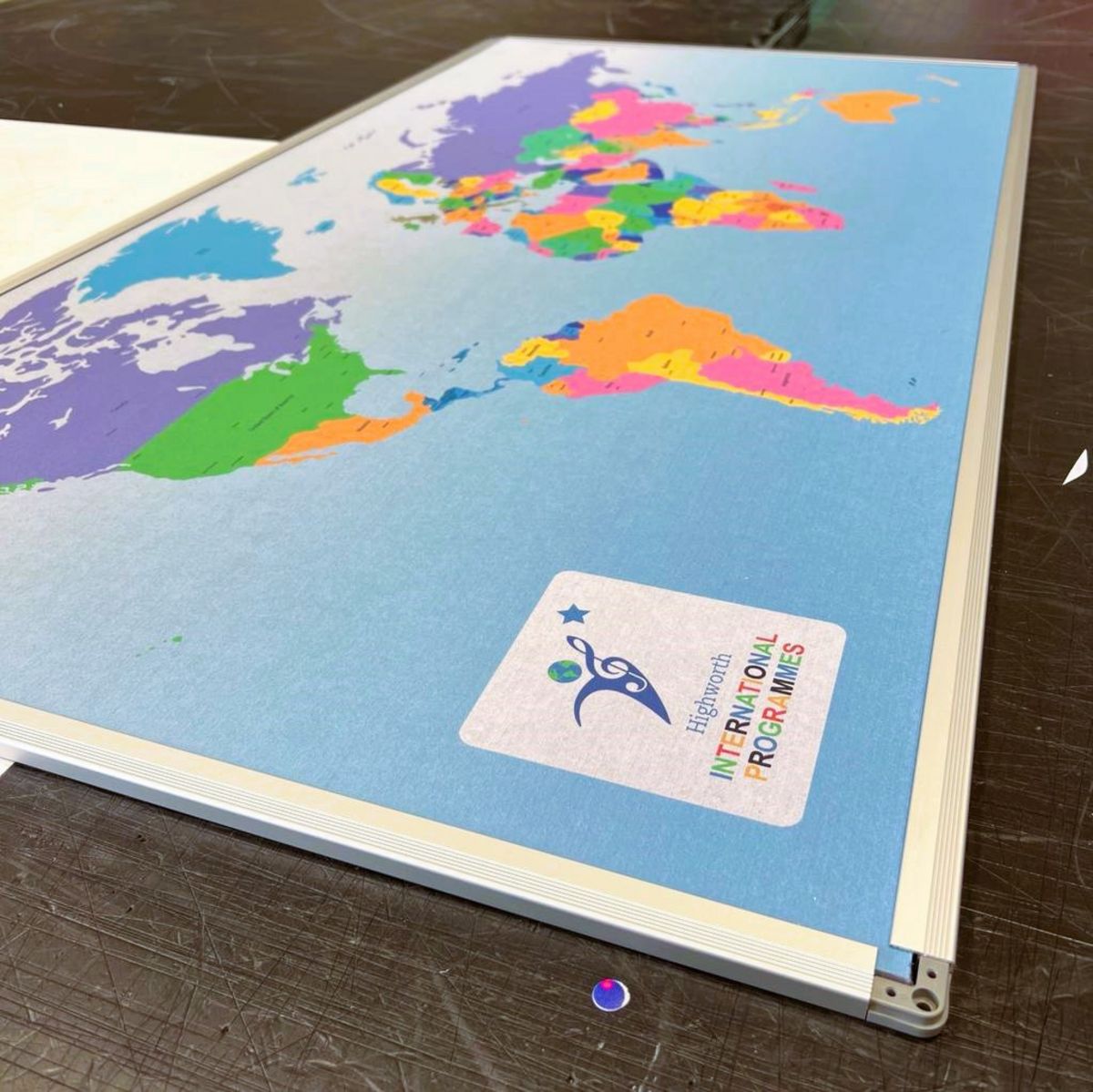 Printed Polycolour Pin Board Notice Board with Colour World Map Aluminium Frame Corner Shot.jpg