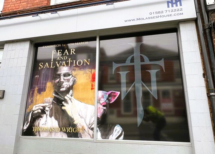 Printed Window Graphics Displays For Events at Molasses House.jpg