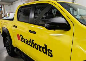Drivers Side Close-Up Wrap & Branding - Toyota Hilux Invincible X for Bradfords Building Supplies Drivers Side Close-Up Wrap & Branding - Toyota Hilux Invincible X for Bradfords Building Supplies
