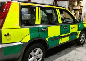 Close up of nautical compass in sunset colours on VW Transporter bonnet - created and printed by Creative Solutions