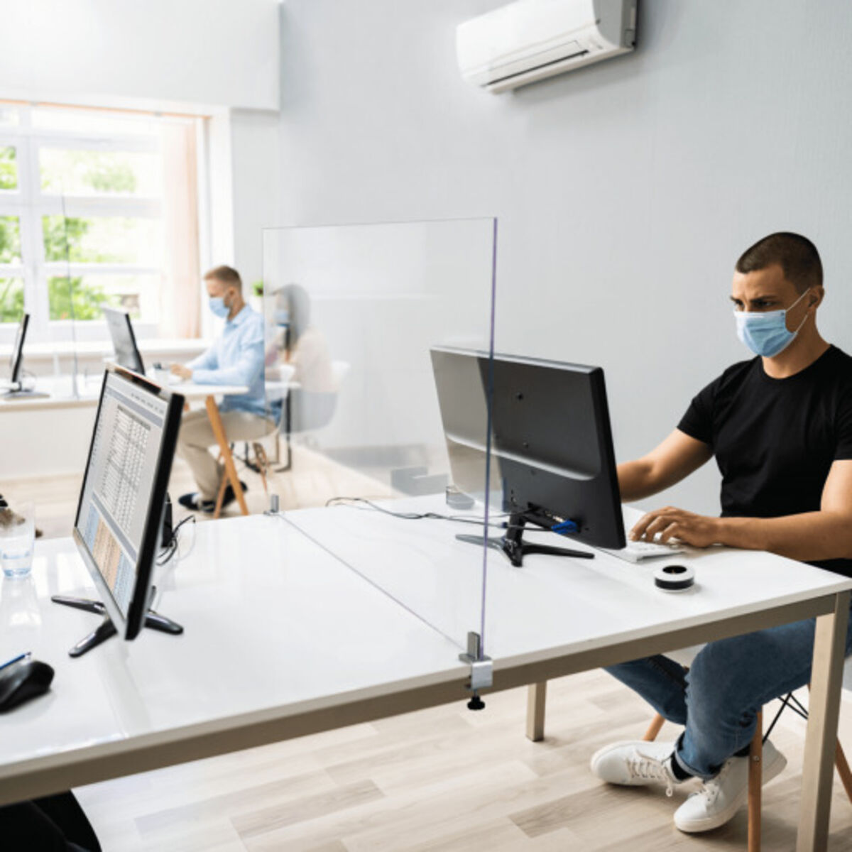 Screen separating office desk spaces.png