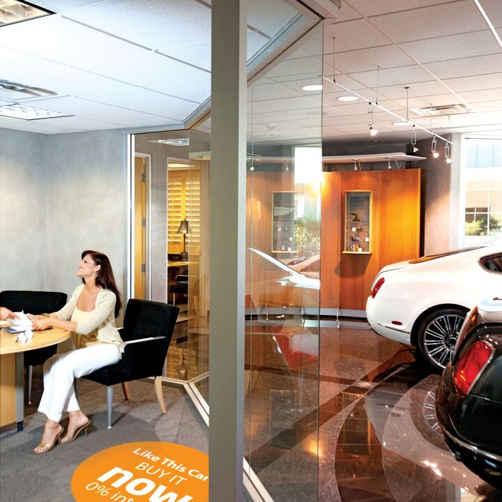 Signtac Self-Adhesive Floor Graphic in a car showroom showing car financing artwork.jpeg