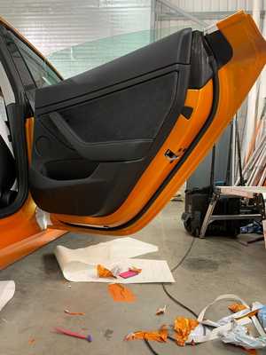 Door stay interior wrapping to give complete coloured finish
