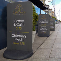 Three Ecoflextra_s outside restaurant showing Cafe Ocean artwork.jpg