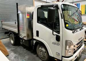 Before - White Nissan NV200 Van White Nissan NV200 Ready for Vehicle Branding Graphics