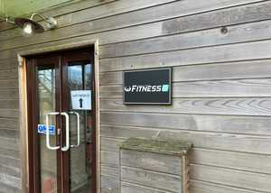 Entrance Sign for Fitness Centre. Wall Mounted onto Wooden Wall.