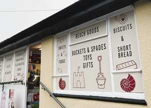 Completed custom Printed window decal installation and new branding for Holmbush Cafe in Lyme Regis Completed custom Printed window decal installation and new branding for Holmbush Cafe in Lyme Regis