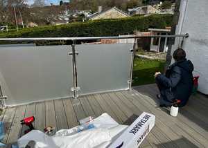 Frosted Window Film Application to Balcony Glass Panes