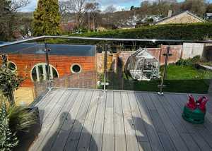 BEFORE - Frosted Vinyl Installation on glass balcony panes for privacy