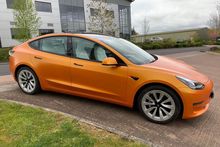 Orange Vinyl Wrap for Tesla Model 3 - Side Profile Orange Vinyl Wrap for Tesla Model 3 - Side Profile
