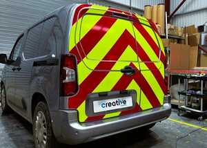 Completed chevron kit to rear doors of a Vauxhall Combo E - Retro-Reflective Red and Non-Reflective Yellow Vehicle Graphics