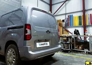 Chevron Kit being applied to the rear doors of a Vauxhall Combo E