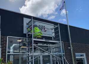 Scaffolding Tower to install business signage - aluminium tray sign