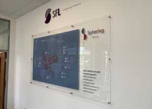 Reception Area welcome displays - custom created acrylic logo and printed clear acrylic wall map