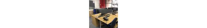 Surface Mounted Bracket for Acrylic Screens In A Shared Deck Office Environment.jpg