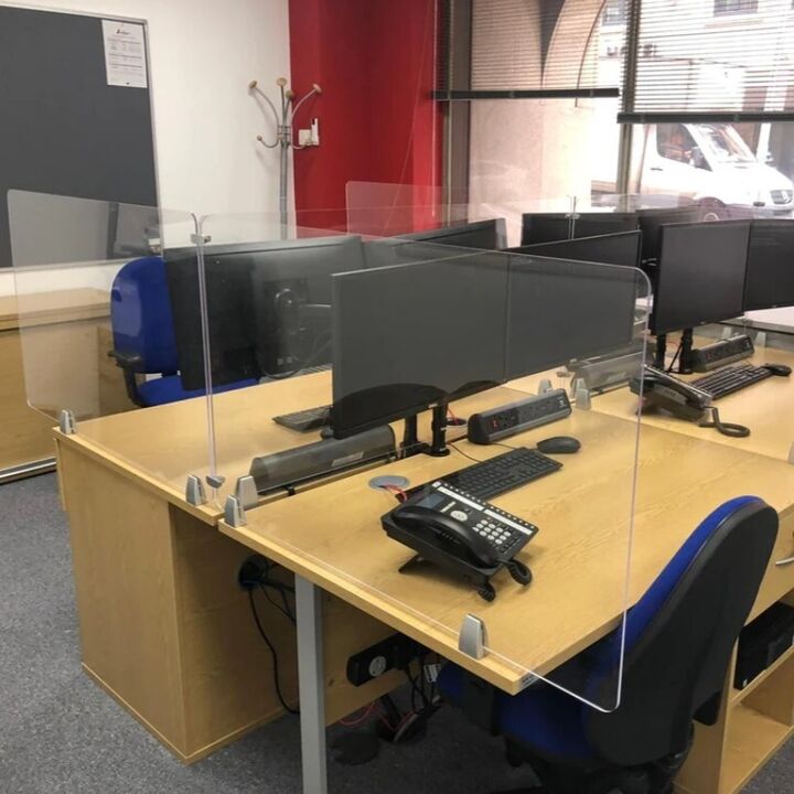 Surface Mounted Bracket for Acrylic Screens In A Shared Deck Office Environment.jpg