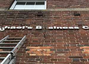 Old Stand-Off LEttering Signage Damaged and Falling off Wall