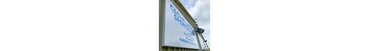 Powder Coated Fabricated Aluminium Sign Trays Fitted To Cladded Industrial Building With Vinyl Branding Applied.jpg