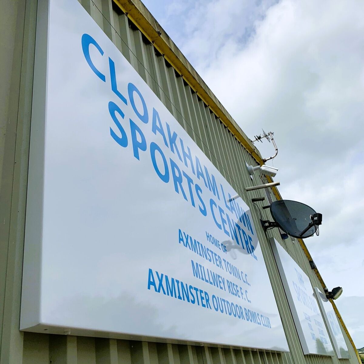 Powder Coated Fabricated Aluminium Sign Trays Fitted To Cladded Industrial Building With Vinyl Branding Applied.jpg
