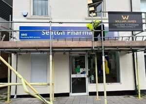Scaffolding Tower To Install New Pharmacy Facia Sign