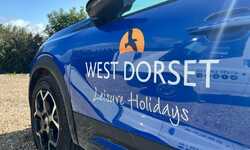 Vehicle Signwriting for West Dorset Leisure Holidays Vauxhall Mokka's & Vauxhall Combo Van