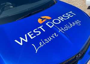 Vehicle Branding Graphics on Bonnet of Blue Vauxhall Mokka for West Dorset Leisure Holidays