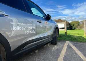 Vehicle Branding Graphics on Grey Vauxhall Mokka for West Dorset Leisure Holidays