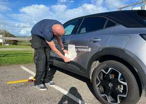 Installing Vehicle Branding Graphics on Grey Vauxhall Mokka for West Dorset Leisure Holidays