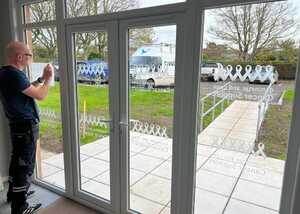 Expert Installation Team working on the ALCS Custom Branded Glass Manifestations