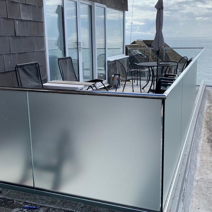 Silver Etched Vinyl On External Balcony Glass For Privacy.jpg