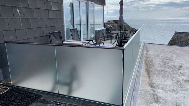 Silver Etched Vinyl On External Balcony Glass For Privacy.jpg