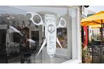 Custom Cut White Vinyl Window Graphic For Slays Barbers.jpg