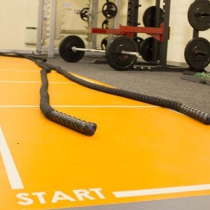 Custom Printed Floor Graphic Stuck To Carpet In Gym Setting