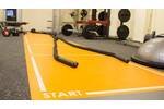 Custom Printed Floor Graphic Stuck To Carpet In Gym Setting