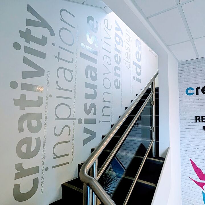 Light Grey Cut Vinyl Gloss Finish Wall Graphics Leading Up Stairs At Creative Solutions.jpg