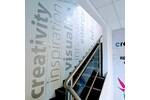 Light Grey Cut Vinyl Gloss Finish Wall Graphics Leading Up Stairs At Creative Solutions.jpg