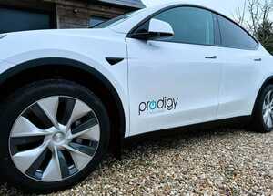 Prodigy IT Solutions Vehicle Branding Graphics Passenger Door Graphic Close-Up - Tesla Model Y.jpg