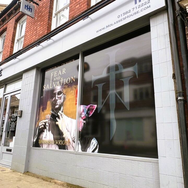 Advertisment Printed Window Graphics for Molasses House.jpg