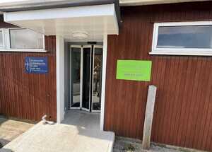 Size matched to sign on left hand side, Nourish now welcomes you to Cross Keys House in Axminster