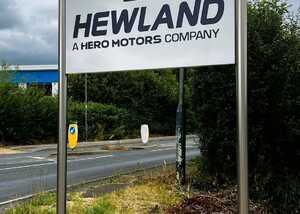 Tailor-made fabricated plaza-style post-mounted tray sign for Hewland Engineering Tailor-made fabricated plaza-style post-mounted tray sign for Hewland Engineering