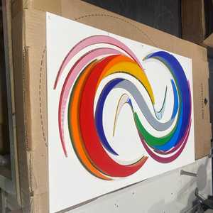 Final logo assembly, mounted to a strong adhesive backing paper ready for installation