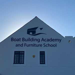 Large Dark Blue Acrylic Logo applied in 3 parts above lettering