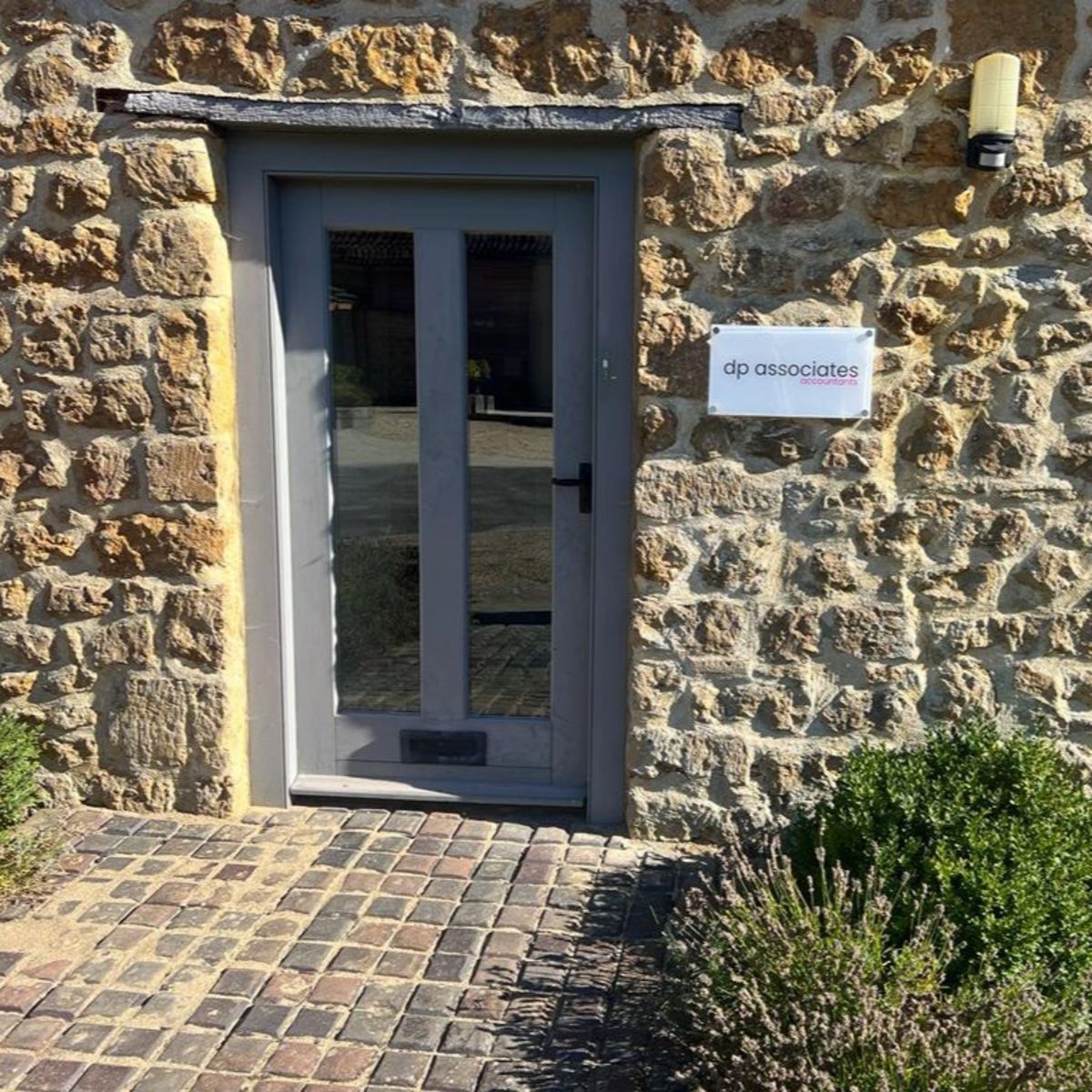 Printed Acrylic Glass Effect Wall Mounted Panel - Printed and Mounted on Stone Wall with Stand Off Locators for Law Firm.jpg