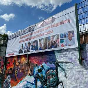 Installation Of Mesh Banners on Fence