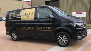 Large Business Graphics VW Transporter Business Vehicle Branding Gold Cut Vinyl Graphics on Black Van