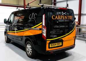 Member of staff expertly cutting vinyl in our cutting-edge vehicle graphic facility